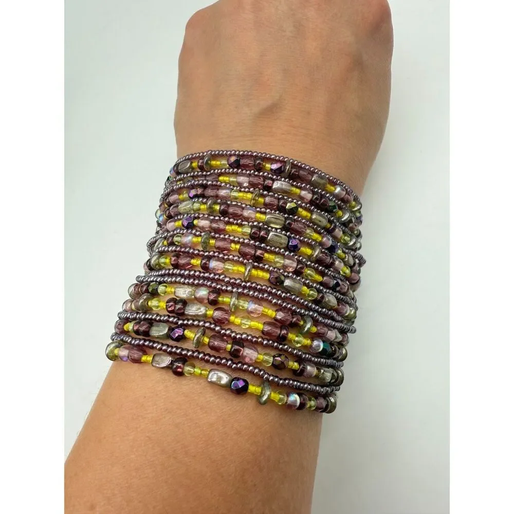 cuff 22 strand purple/green bracelet